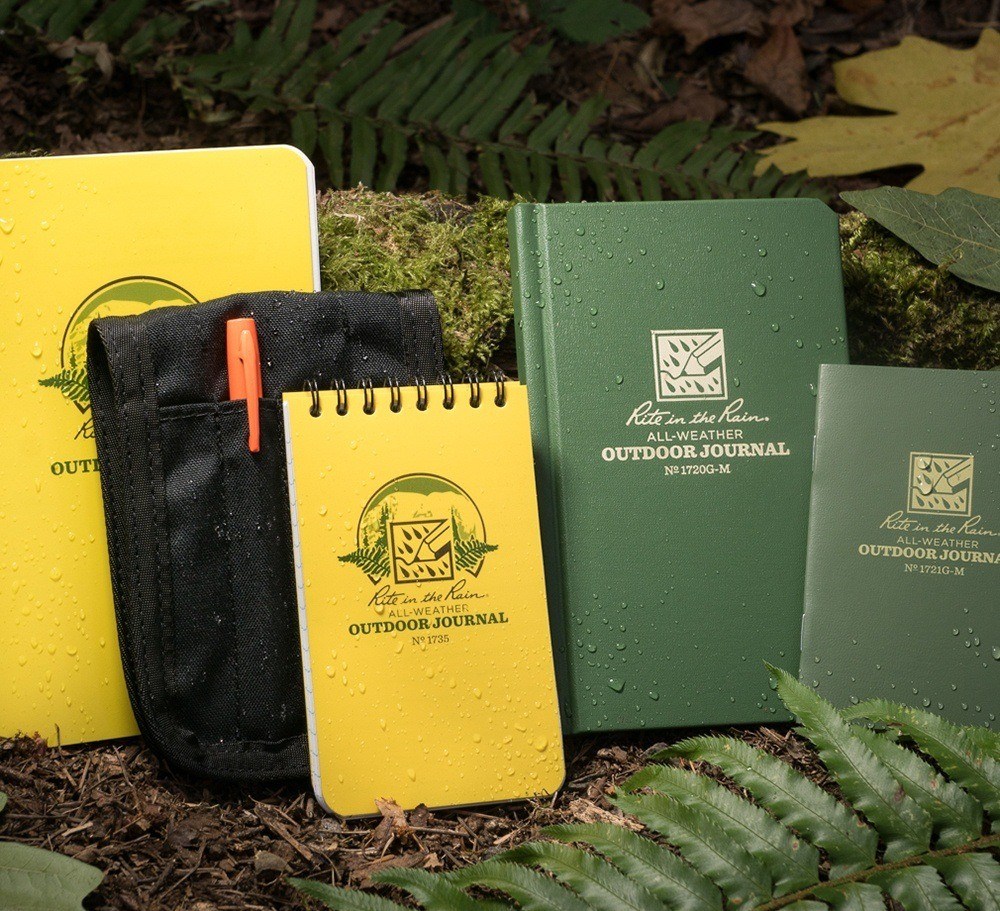 Collection of all weather notebooks and cordura cover.