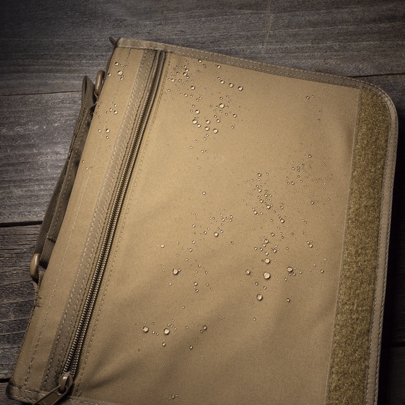 Water drops on closed planner.