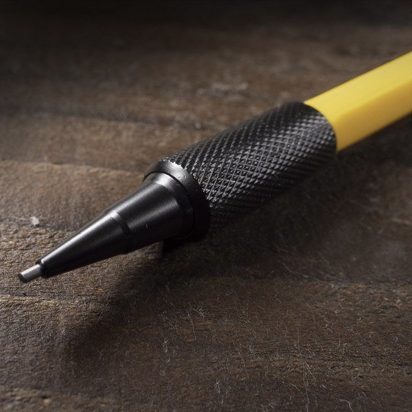 Mechanical pencil tip with knurled-metal grip